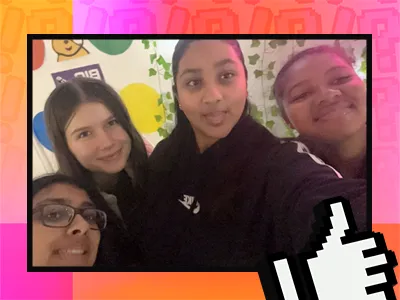 Digital image with a pink border featuring four smiling girls posing for a selfie. In the background is a colourful wall with circular patterns and the letters "BIG".